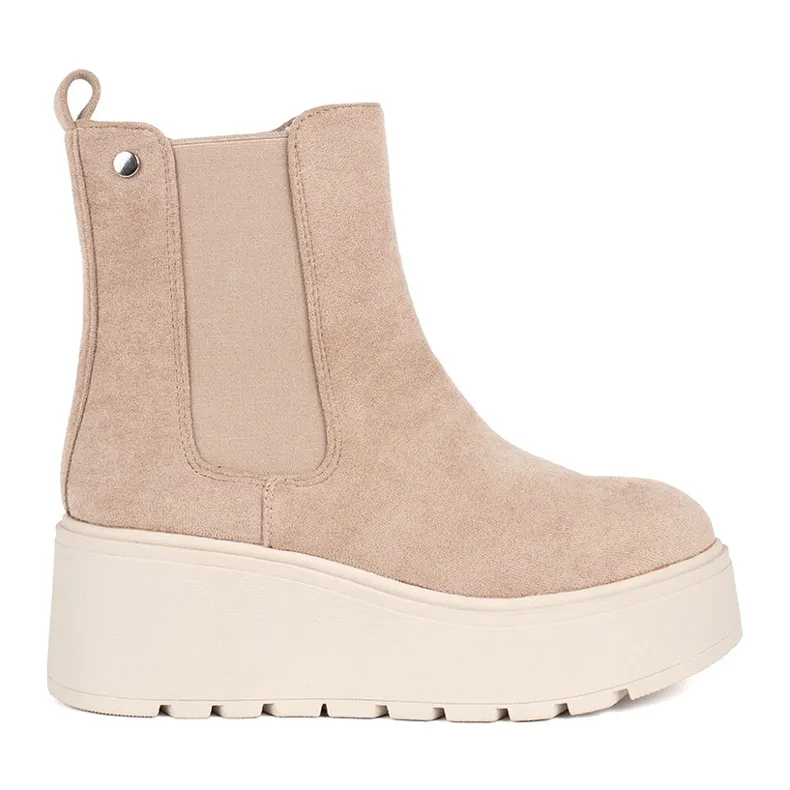 Beige suede wedge boots