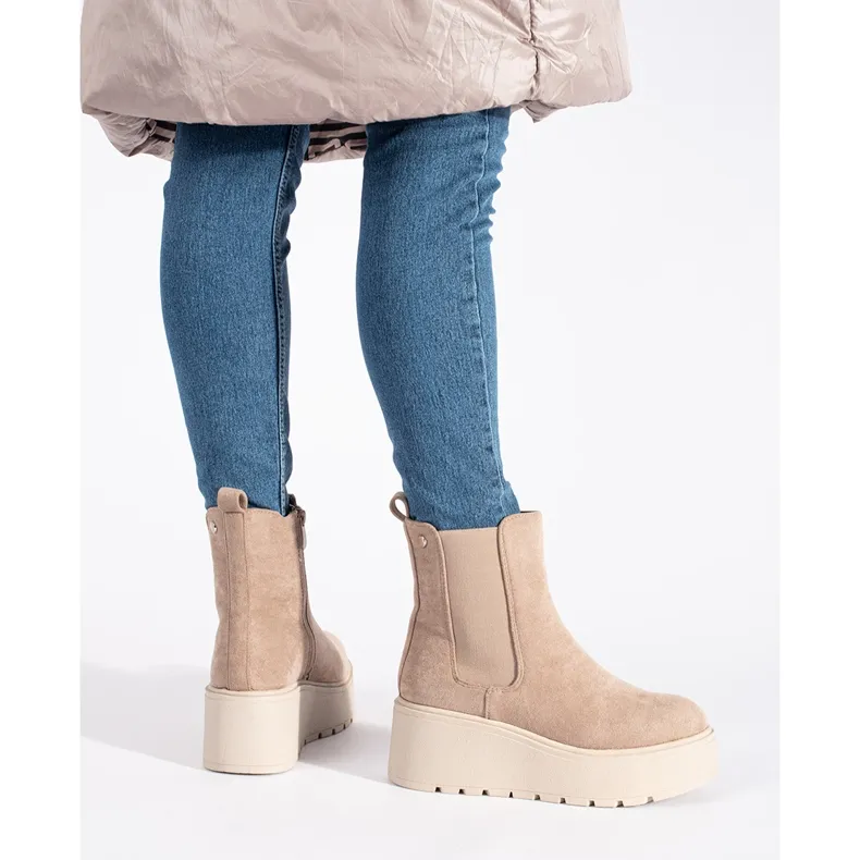 Beige suede wedge boots