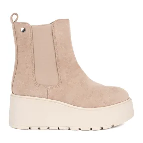 Beige suede wedge boots