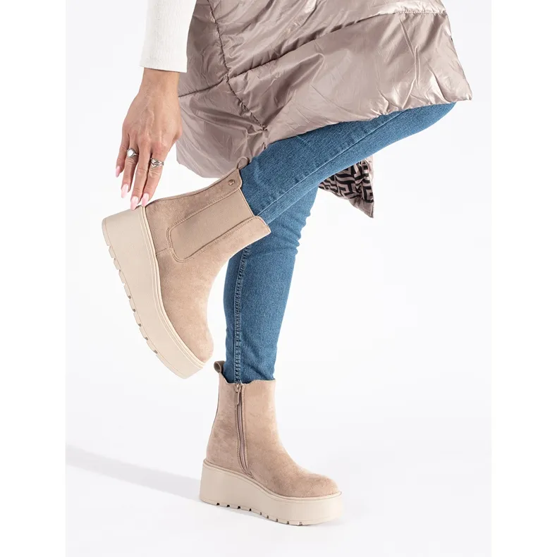 Beige suede wedge boots