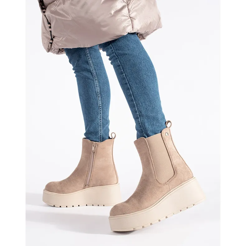 Beige suede wedge boots