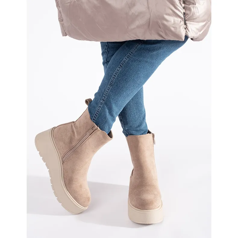 Beige suede wedge boots