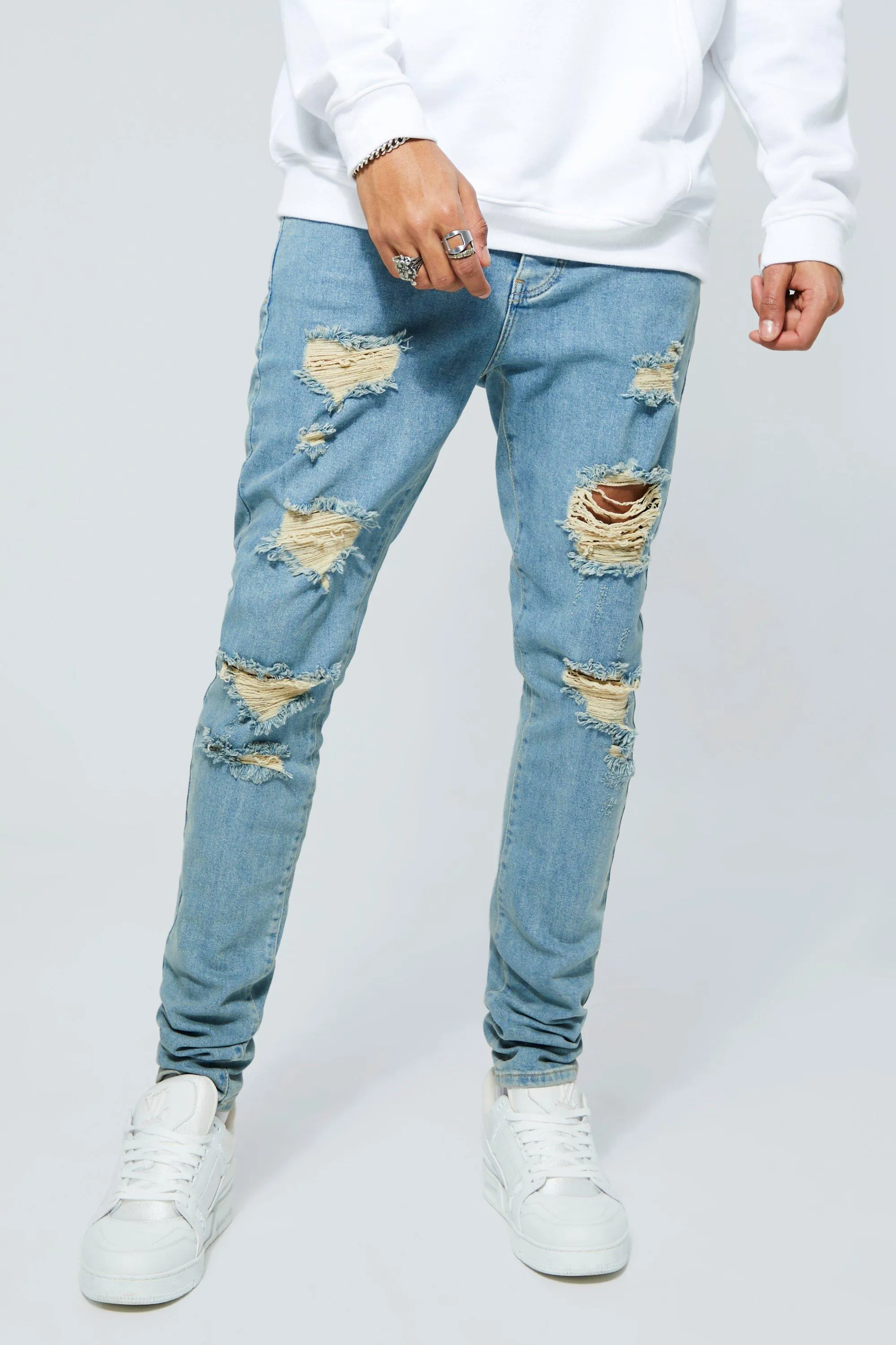 Tall Skinny Stretch All Over Rip Jeans | boohooMAN UK